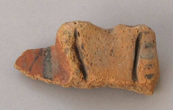 Fragment of a clay vessel