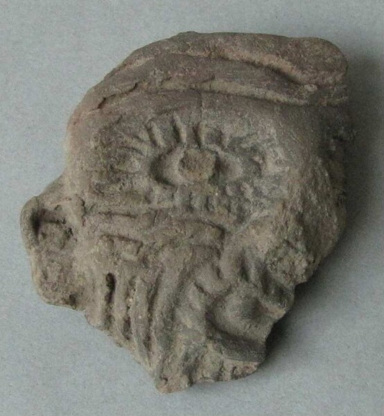 Clay head (fragment)