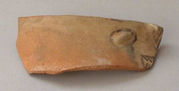 Fragment of a clay vessel