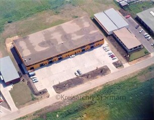 Carl Prediger KG (Kornkamp): Luftbild des Betriebes im Gewerbegebiet am Beimoorweg