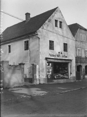 Coswig, Wettinplatz. Geschäftslokal "Feinkost Wild u. Geflügel. Arthur Münch. Außenansicht
