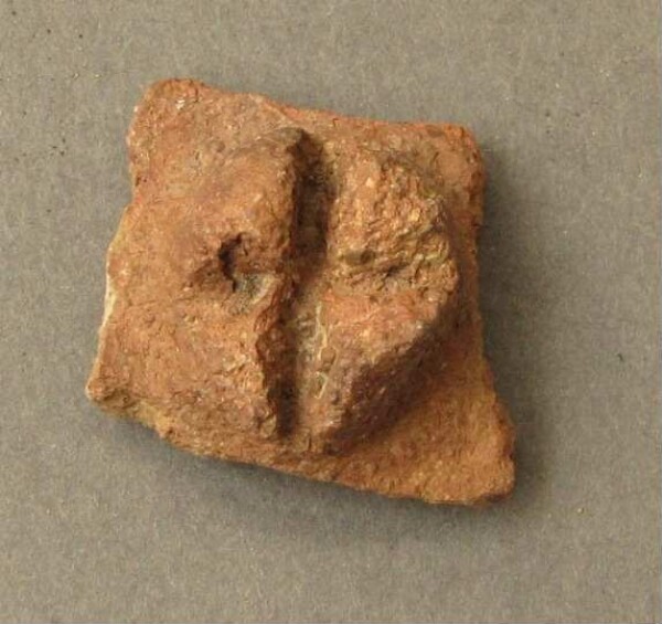 Fragment of a clay vessel