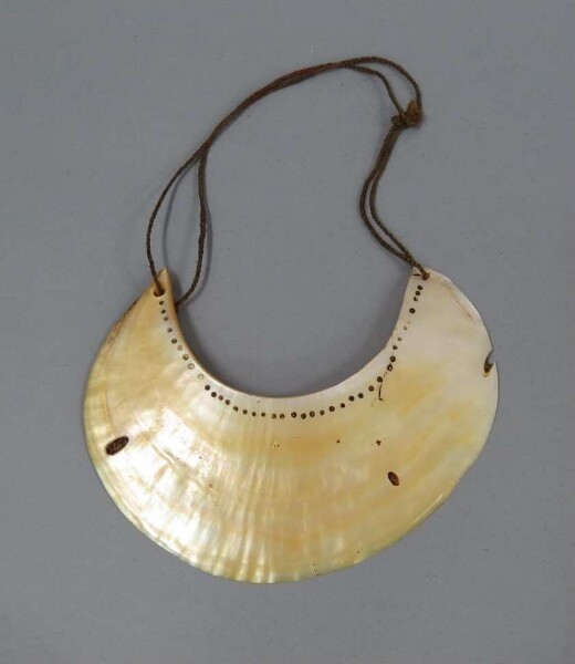 Disque de coquillage comme pendentif