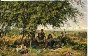 Bauernfamilie beim Gebet unter einem Baum