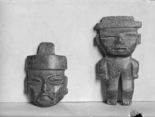kleine Steinmaske & stehende menschliche Figur