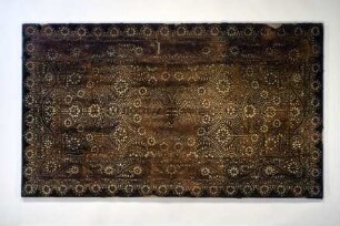 Lederdecke mit durchbrochenem Ornamentmuster