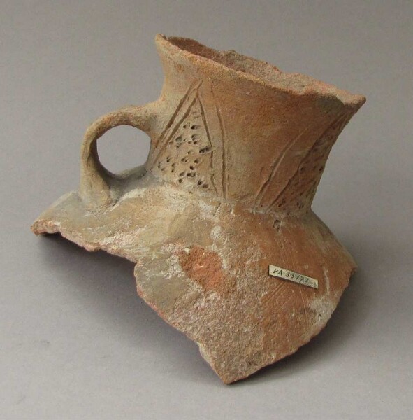 Fragment of a clay vessel