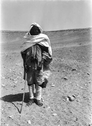 Mann der Tuareg : Portrait eines Mannes der Tuareg, welcher sich als Straßenwärter verdingt.