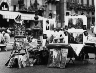 Italien. Maler mit seinem Verkaufsstand in einer Fußgängerzone