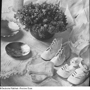 Arrangement mit Taufutensilien