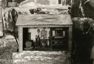 Weihnachtsberg (beweglicher Berg). Detail, Innenraum eines Hauses. Weberstube