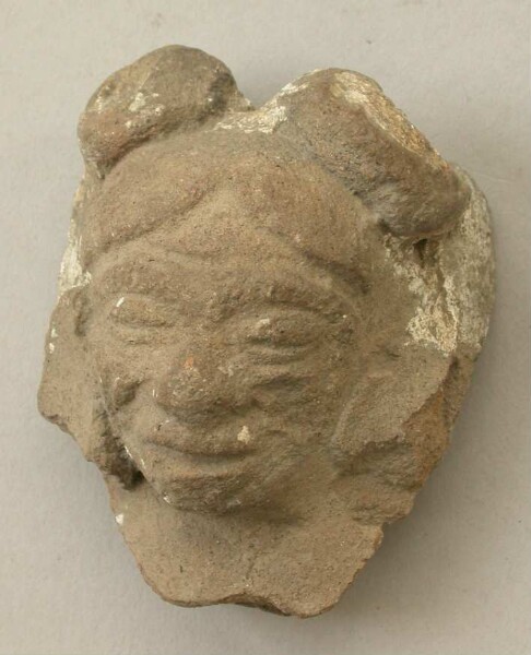 Fragment of a clay vessel