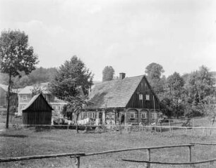Umgebindehaus : Hilgersdorf (Severni/Tschechische Republik). Umgebindehaus im Ort