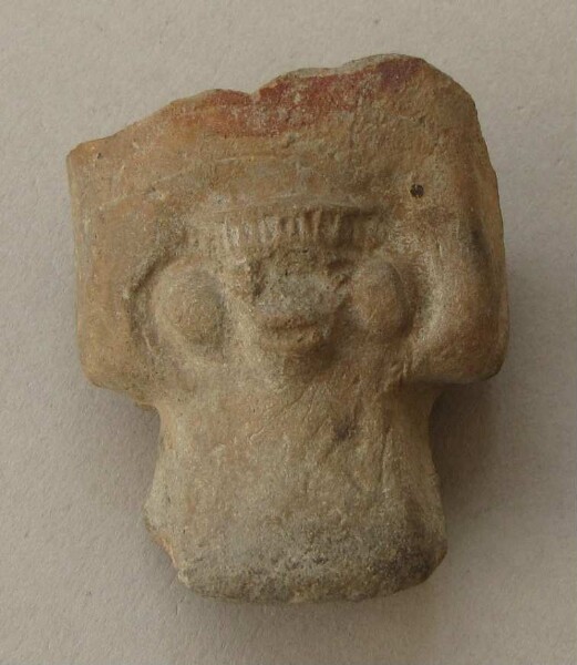 Clay vessel foot as clay head