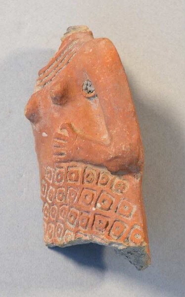 Torso of a clay figure