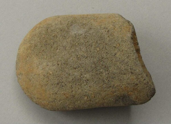 Stone axe blade (fragment)