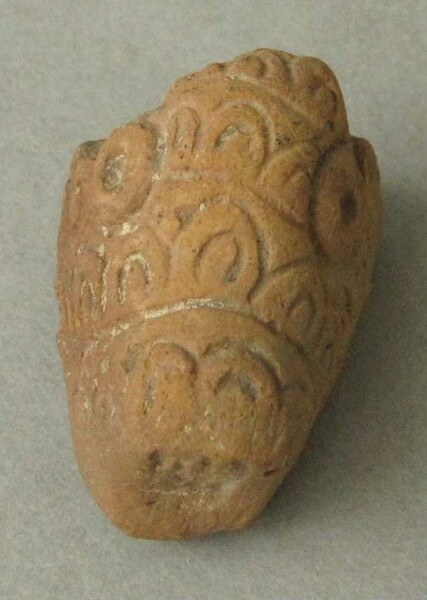 Fragment de figurine en argile