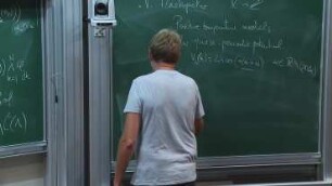 1/3 Large systems of interacting quantum particles in a random field