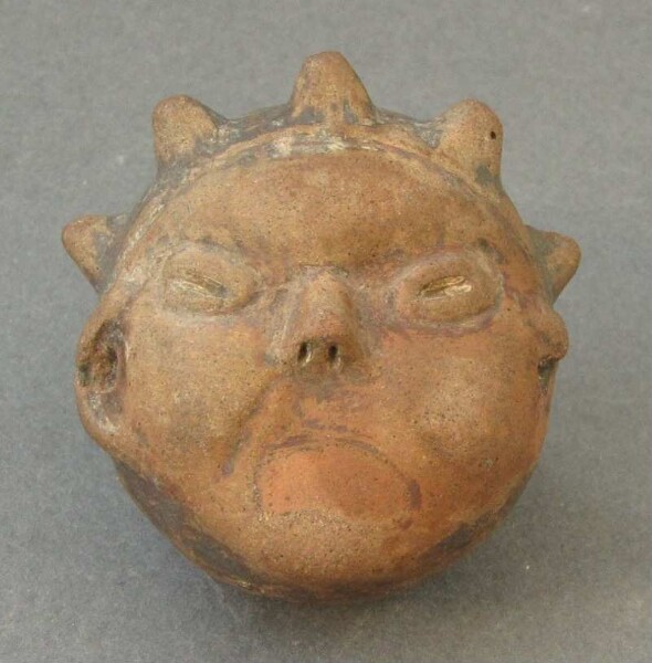 Clay vessel (clay head, fragment)