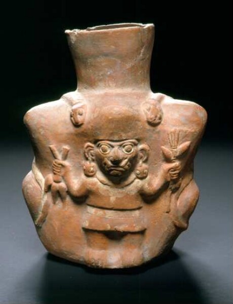 Relief: anthropomorphic standing figure with crops