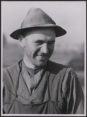 Portrait eines Mannes mit Schürze und Hut