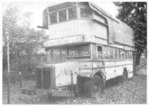 Wrack eines Doppelstockbusses mit Schultheiss-Werbung
