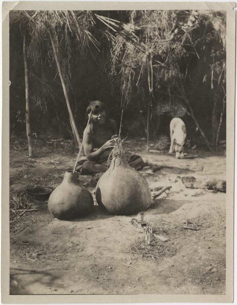 Ashluslay Indians drinking Algarrobo beer. Rio Pilcomayo