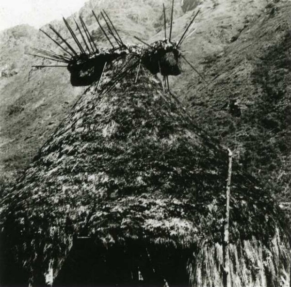 Temple. Symbol of the sun on the roof.