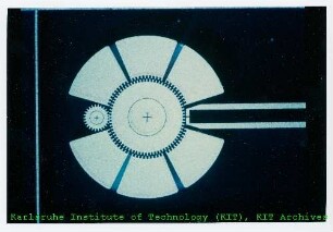 Rasterelektronenmikroskop (REM)-Aufnahme zweier Mikrozahnräder des Instituts für Mikrostrukturtechnik (IMT)