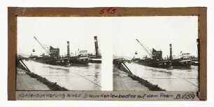 Kohlenbunkerung eines Braunkohlenbootes auf dem Rhein