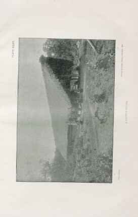Plate XXXV. A Kachin house
