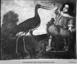 Der Zwerg Gabriello Martinez mit einem schwarzen Storch und einem Ibis