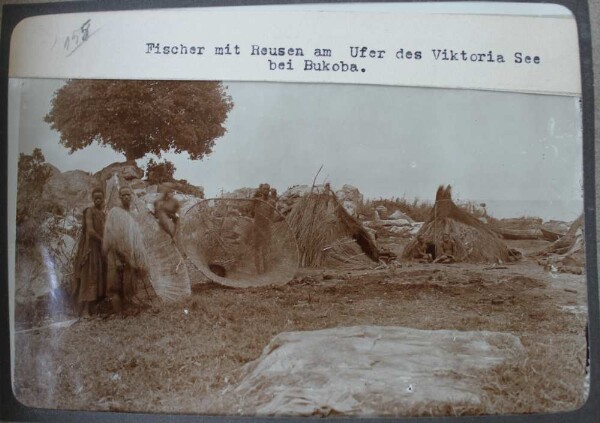 Fishermen with fish traps on the shore of Lake Victoria near Bukoba