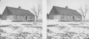 Ein Bauernhaus im Schnee