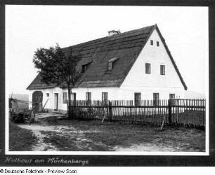 Komari hurka (Mückenberg) bei Obergraupen (Horni Krupka), Huthaus unter dem Gipfel