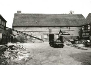 Cossebaude-Niederwartha, Weistropper Straße 6. Vierseithof (1803, 1856, 1930). Quergebäude. Hofseite