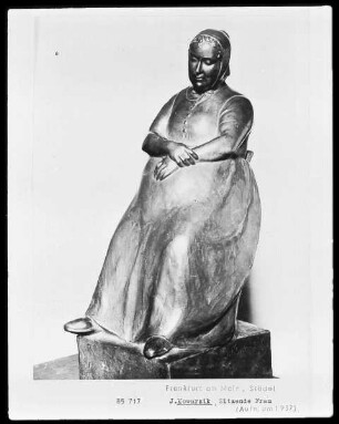 Sitzende Frau