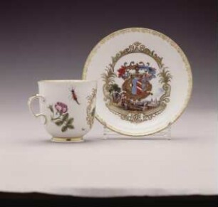Henkeltasse und Unterschale mit Wappen Vido und Landschaftsszenen