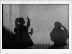 Zamora. Schatten von Gläubigen auf der Hauswand während einer Prozession