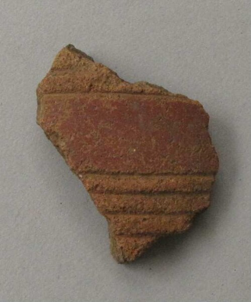 Clay shard of a vessel