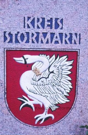 Mommsenstraße 11: Stormarnhaus: Wappenstein vor der Einfahrt zum Innenhof