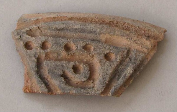 Fragment of a clay vessel