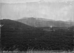 Landschaft : Blick über eine weite, hügelige Landschaft