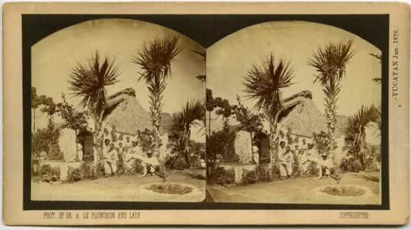 Mrs Le Plongeon with locals and expedition members in front of a Yucatecan house.