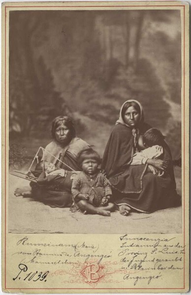 Marie Rumeinam and Innocenzia with three small children.