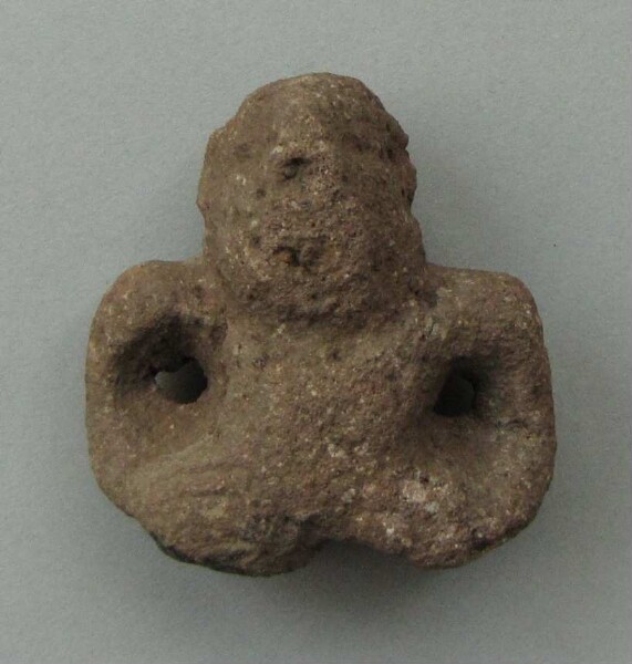 Upper part of a stone figure