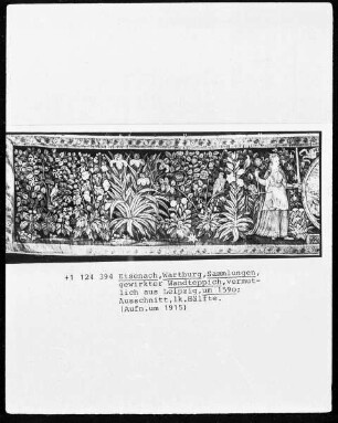 Wandteppich mit floralen Motiven und Justitia