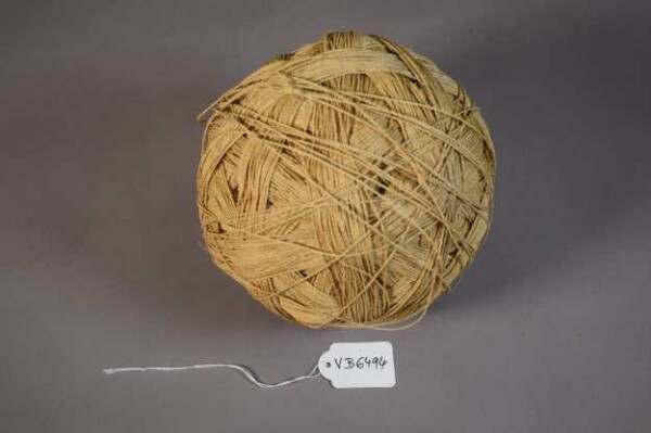 Balls of tucum fibre cords in original packaging