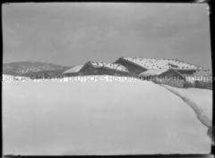 Winterlandschaft mit Bauernhäusern