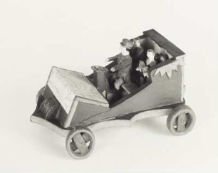 Autofahrt : Spielzeugauto mit Figuren